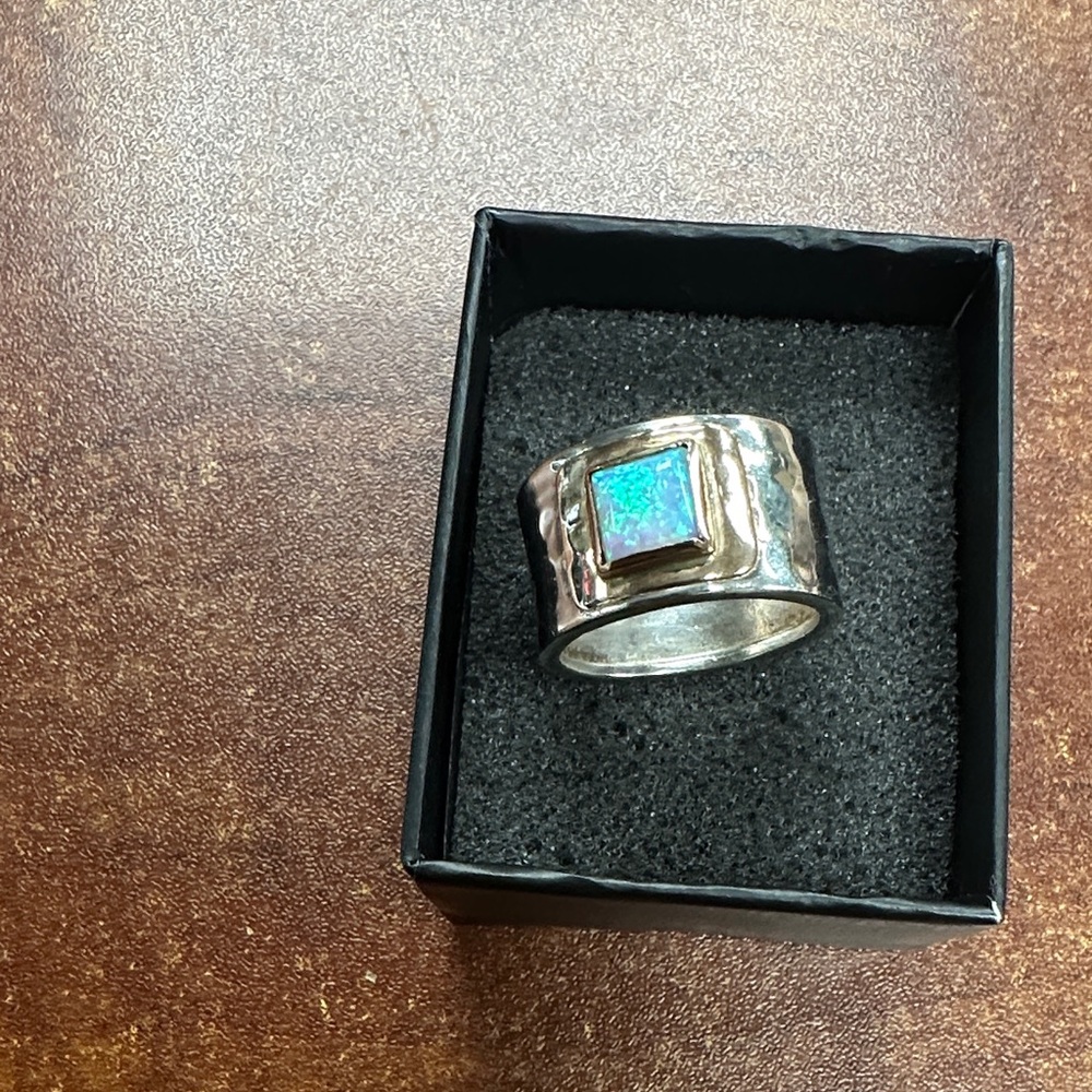 Stunning Silver Ring with Iridescent Blue Stone